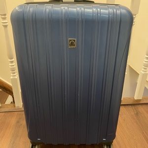 DELSEY Expandable Luggage w/ Spinner Wheels, Blue Textured, Checked-Large 29Inch